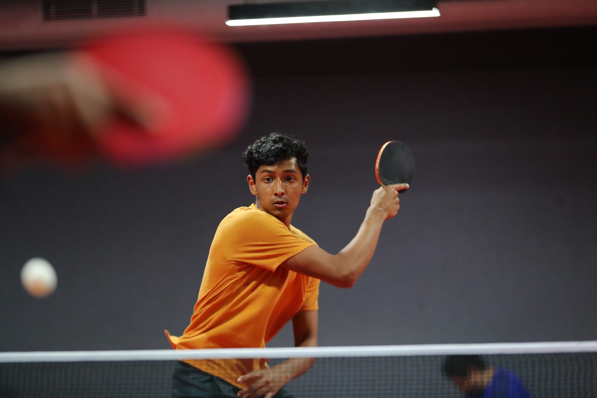 Me playing at a table tennis tournament